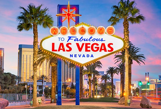 A large lit up sign reads "Welcome to Fabulous Las Vegas Nevada"