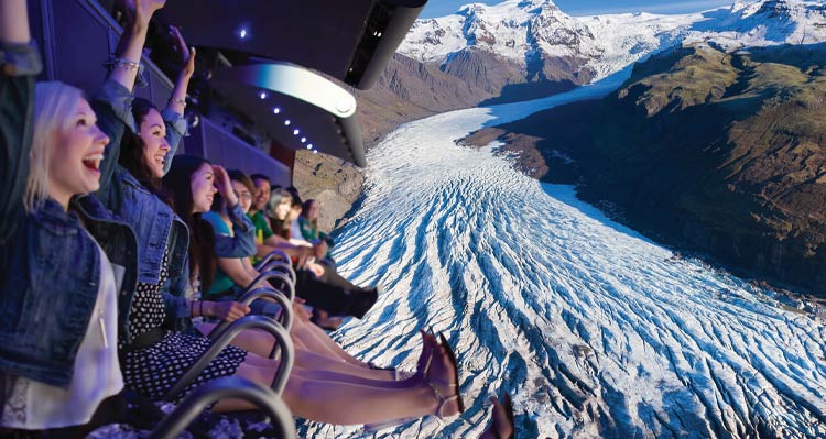 A row of people on the FlyOver Iceland ride